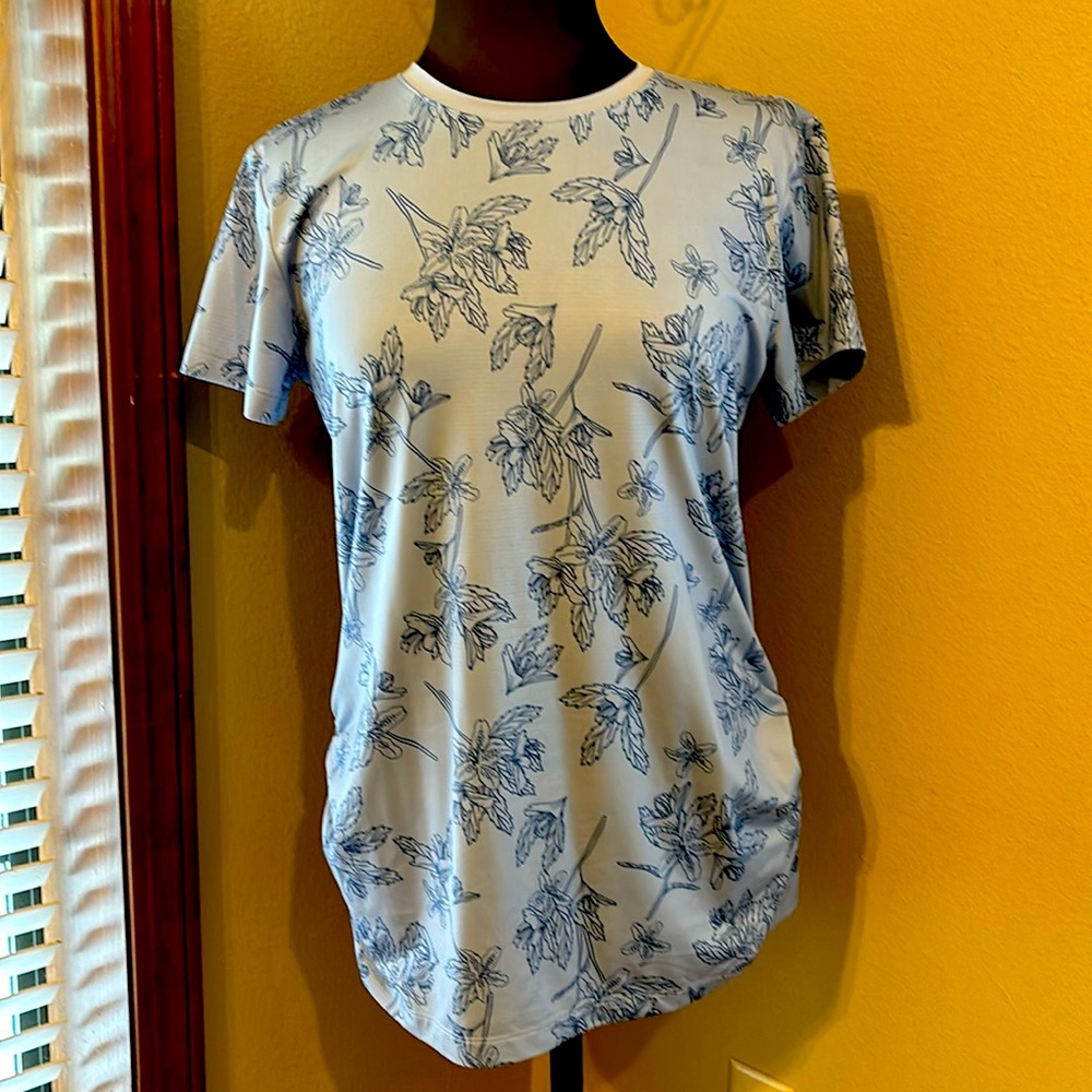 Brand new Columbia floral print tee with side ruching detail. Lone length.